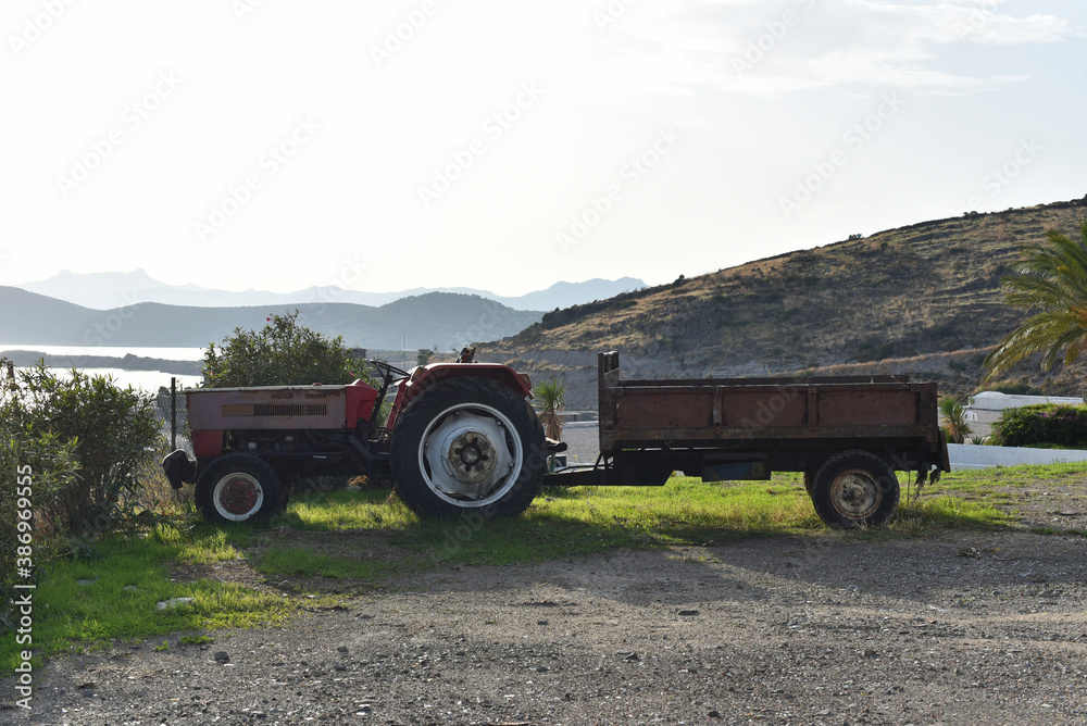 Old tractor with trailer in Turkey mountains Old tractor with trailer in Turkey mountains