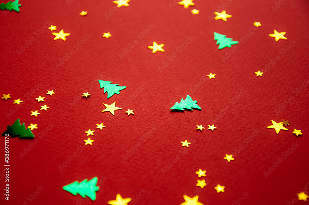 green Christmas trees on a red background,