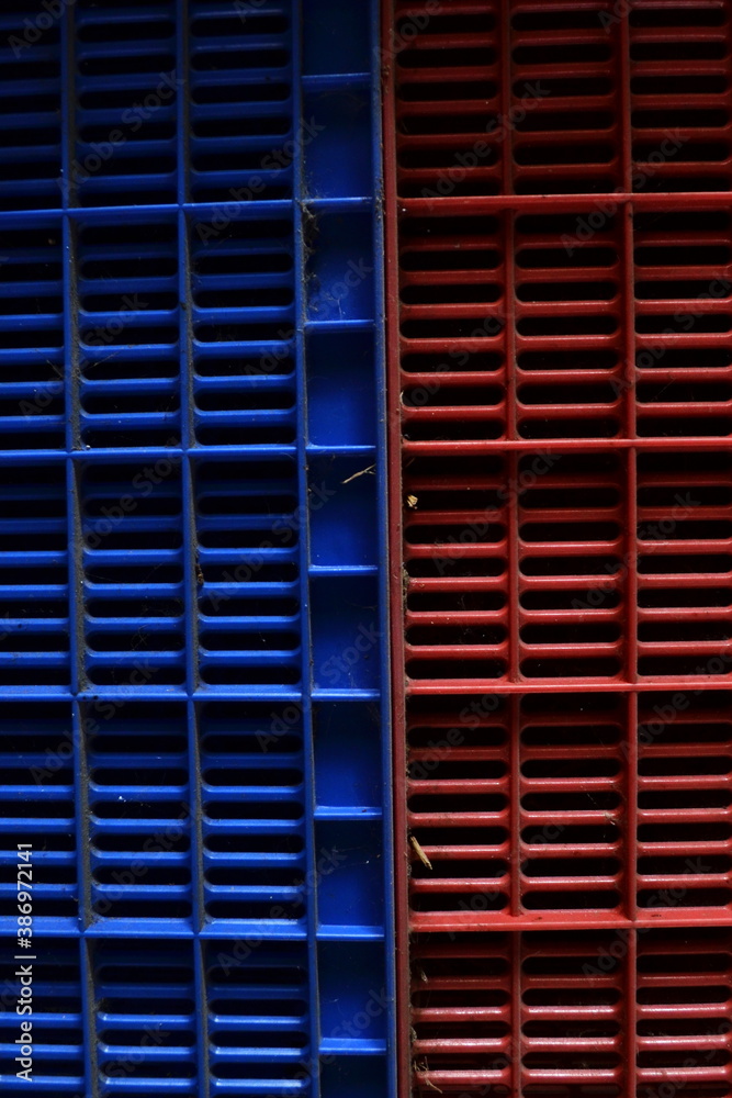 blue plastic baskets stacked with red plastic baskets blue plastic baskets stacked with red plastic baskets