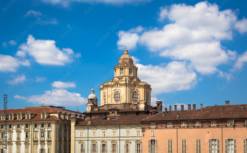 Fototapeta premium Perspective on the elegant Saint Lawrence church in Turin with a blue sky