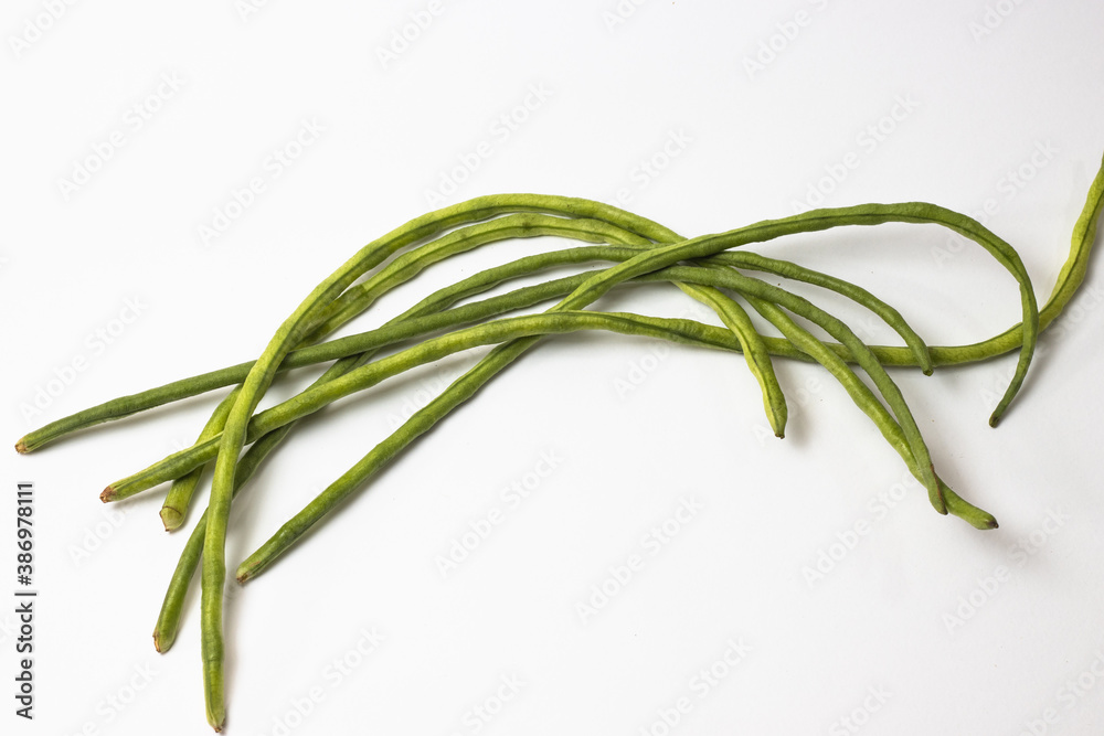 Fresh isolated green long bean on white background Fresh isolated green long bean on white background