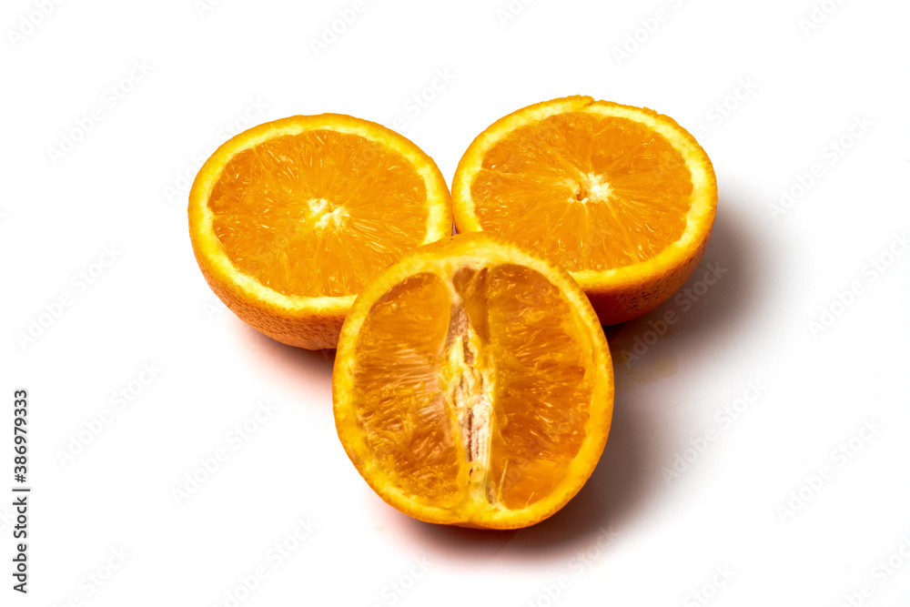 Rough cut sliced orange fruit on white background Rough cut sliced orange fruit on white background