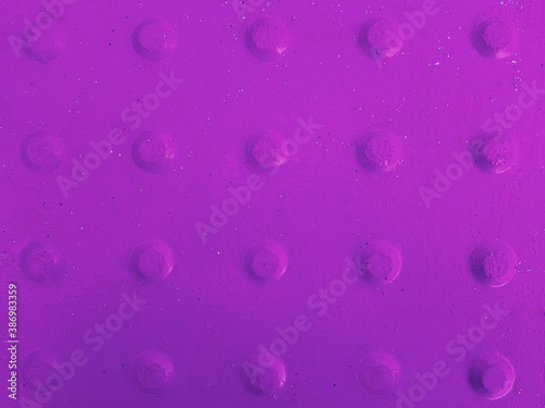 Purple abstract background with convex dots.