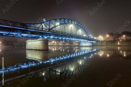 Krakow Poland, Pilsudski bridge over Vistula river in the night