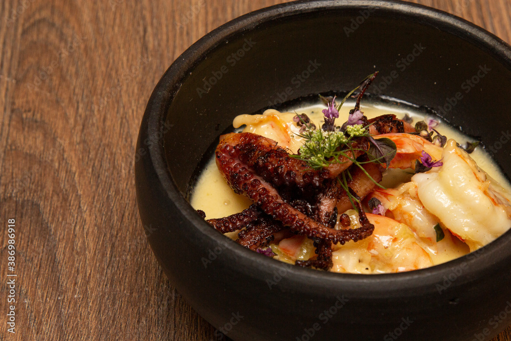 Shrimp and Octopus Casserole with Honey and Flowers Sauce. Shrimp and Octopus Casserole with Honey and Flowers Sauce.