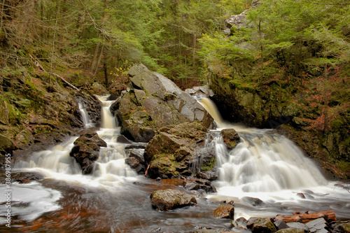 Remote and scenic Bear's Den Falls near New Salem, Massachusetts where the Swift River plunges through a rugged gorge filled with massive boulders.