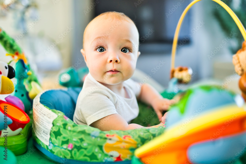 little baby playing with toys at home in the living room little baby playing with toys at home in the living room