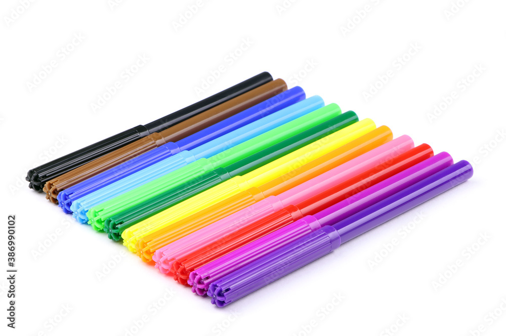 Multicolored felt pens isolated on a white background. Colorful set of marking pen isolated. Home education Multicolored felt pens isolated on a white background. Colorful set of marking pen isolated. Home education