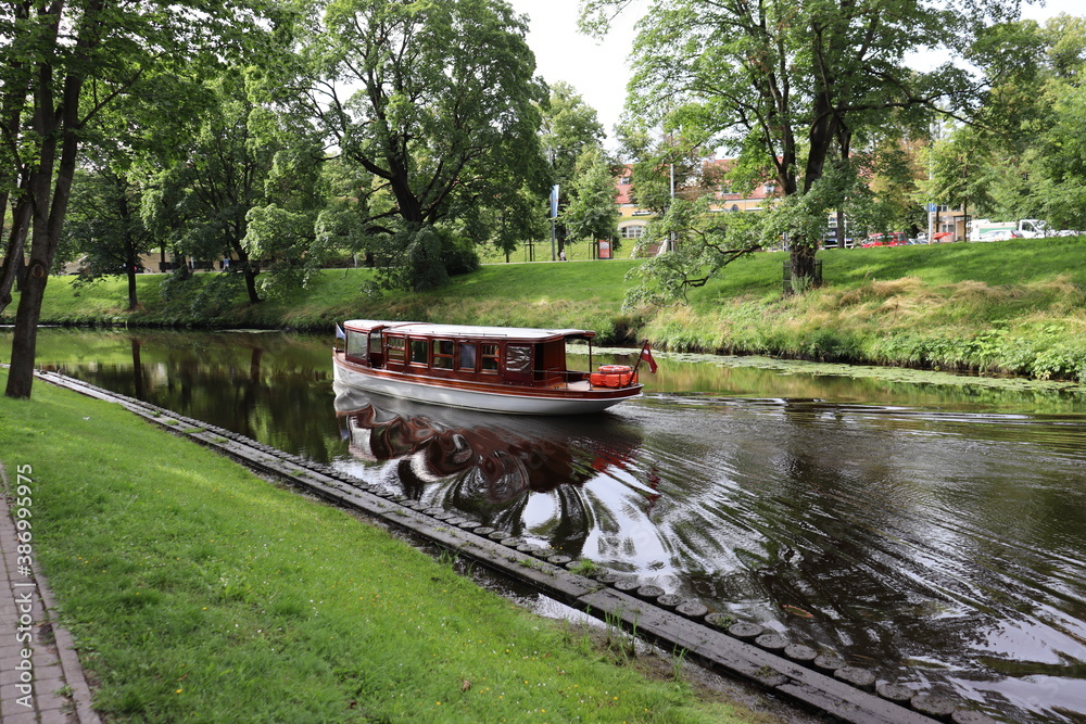 Boat going through a canal in Riga
