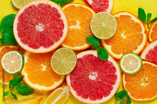 Sliced set, assortment of citrus fruits,, summer background, top view, no people, horizontal, 