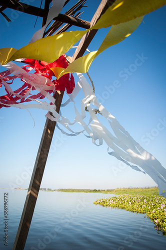 Detail of the decoration that hangs from the roof of a boat in the Coyuca de Benitez lagoon, in the Mexican state of Guerrero, in southern Mexico photo