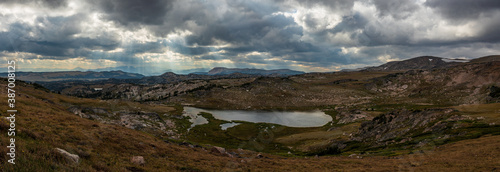 Mountain lake panorama with dramatic lighting