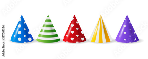Cartoon illustration with different birthday hat on white background for any purpose. Birthday hat in realistic style on blue background. Festive set isolated.
