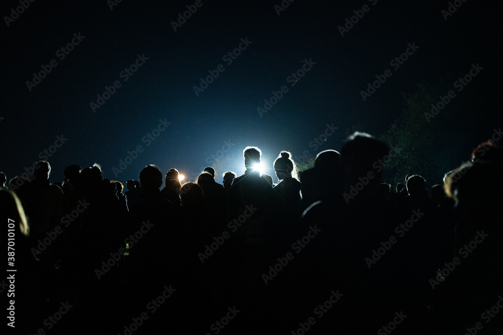 crowd of people in night light