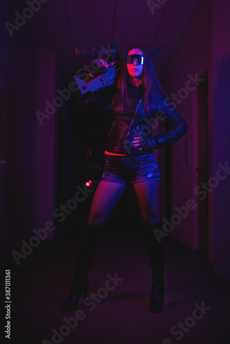 Cyberpunk soldier girl with a guns concept.