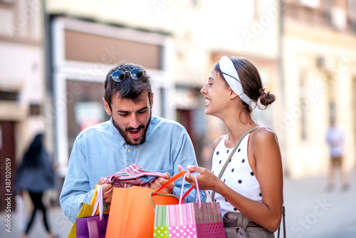 Couple with shopping bags in the city