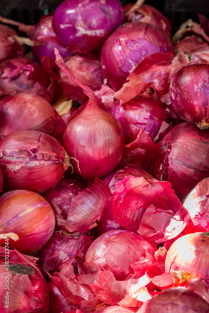 A Display of Red Onions For Sale A Display of Red Onions For Sale