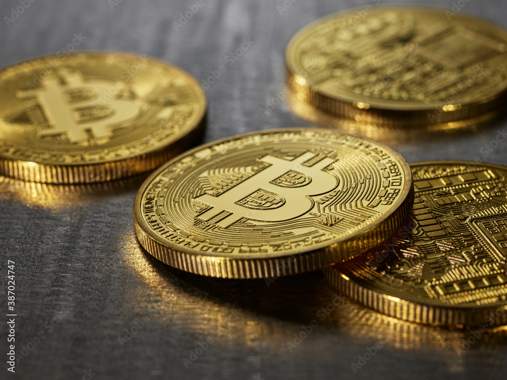 Bitcoins stacked on top of each other Bitcoins stacked on top of each other