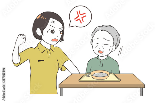 手をあげる女性介護士　身構える高齢女性