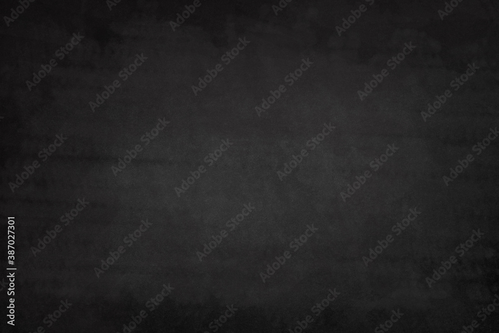 Blackboard Chalkboard texture.Empty blank black grey dirty chalkboard.School board background with traces of white chalk. Cafe, bakery, restaurant menu template.Grunge copy space.