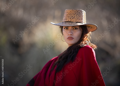Woman in a cowboy in a hat photo