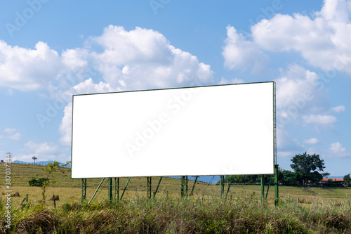 billboard installed in rural area. Painel de propaganda