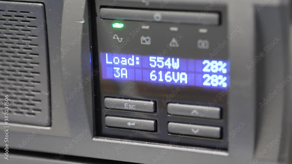 Front View Of Two Grey Ups Machines, Emergency Power Source, Backup Battery Front View Of Two Grey Ups Machines, Emergency Power Source, Backup Battery