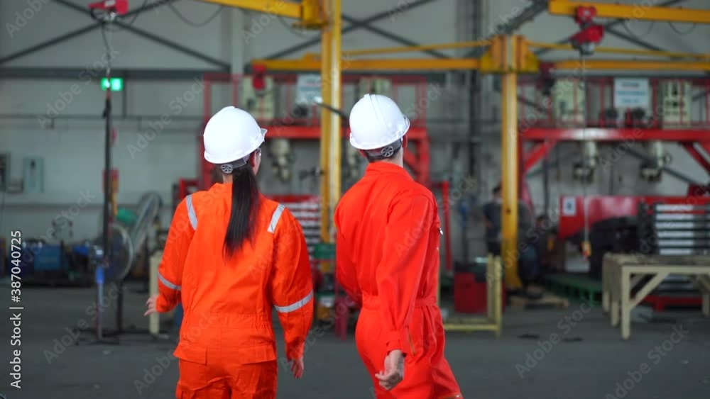 Playful two worker dancing at industrial factory, Working relax concept Playful two worker dancing at industrial factory, Working relax concept