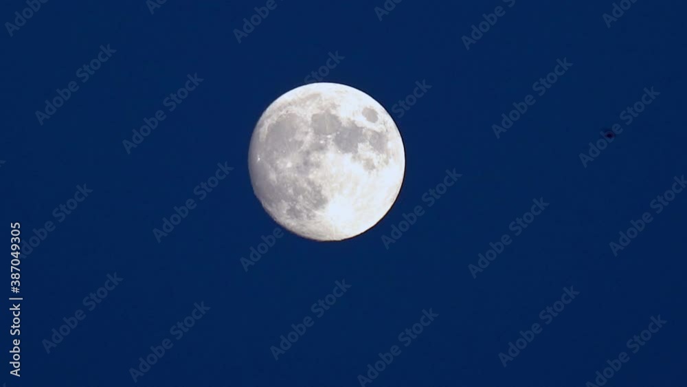 Isolated Full Moon, Illuminated In The Dark Night Sky Isolated Full Moon, Illuminated In The Dark Night Sky