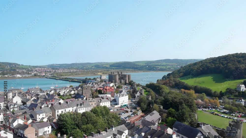Rising drone shot of the historic town of Conwy on the river Conwy, Wales. Rising drone shot of the historic town of Conwy on the river Conwy, Wales.