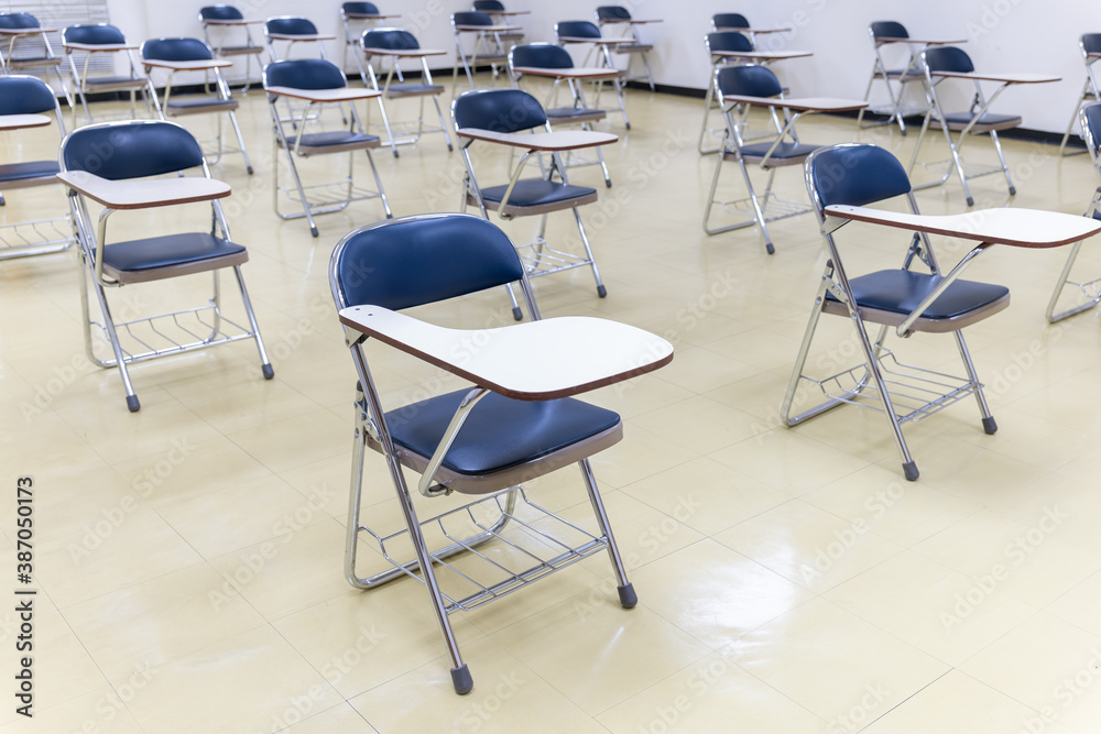 Interior empty classroom in university, Concept of back to school, setting of chair in the room design social distancing