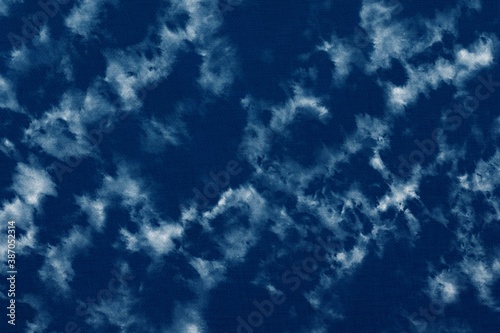 Indigo Blue Shibori Tie dye fabric texture pattern. White and Blue colors.