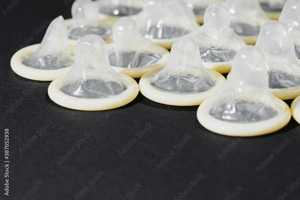 condoms on a black background, flat layer, condoms on a black background, flat layer,