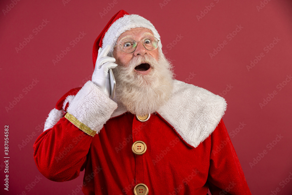 Holly jolly x mas! Santa in headwear, costume, black belt, white gloves brings gifts for kids, prepared to celebrate, sale promotion, winter december, chatting on telephone. Santa talking on the phone Holly jolly x mas! Santa in headwear, costume, black belt, white gloves brings gifts for kids, prepared to celebrate, sale promotion, winter december, chatting on telephone. Santa talking on the phone