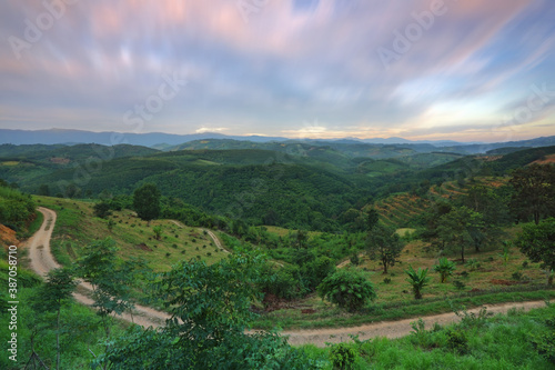Beautiful landscape view sky movement on green mountain in morning at Nan Province of Thailand