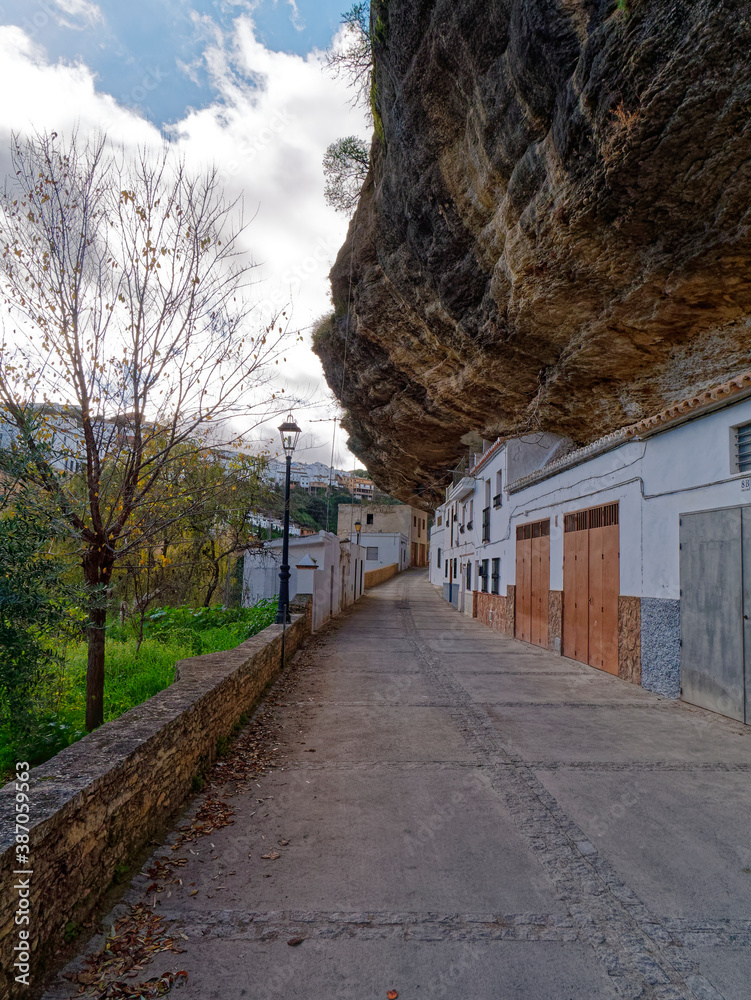 View of Streets and Houses on Rocks in Setenil de las Bodegas city View of Streets and Houses on Rocks in Setenil de las Bodegas city