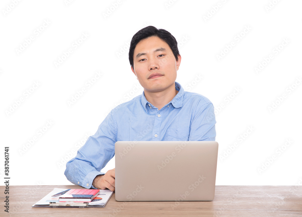 Asian man looks into the camera after work Asian man looks into the camera after work