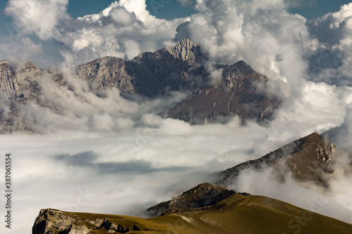 Clouds in the mountains of Ingushetia, Russia. View from  the top of Stolovaya mount (Myat-Loam) photo