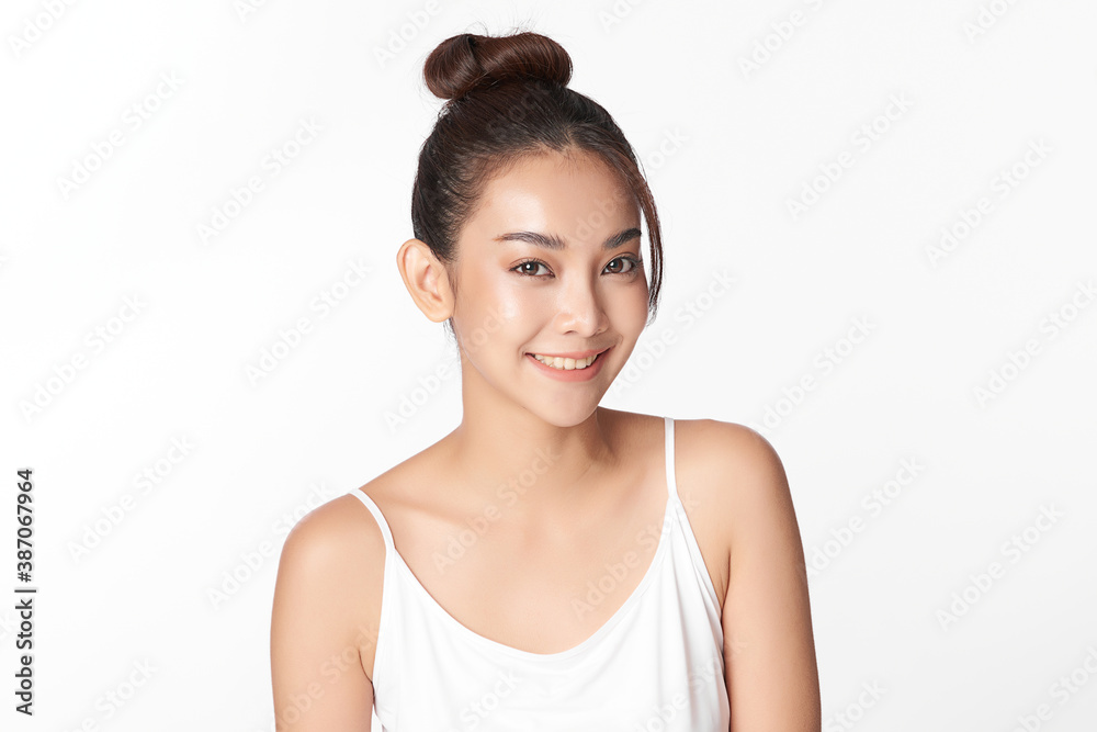 Beautiful young asian woman with clean fresh skin on white background, Face care, Facial treatment, Cosmetology, beauty and spa, Asian women portrait Beautiful young asian woman with clean fresh skin on white background, Face care, Facial treatment, Cosmetology, beauty and spa, Asian women portrait