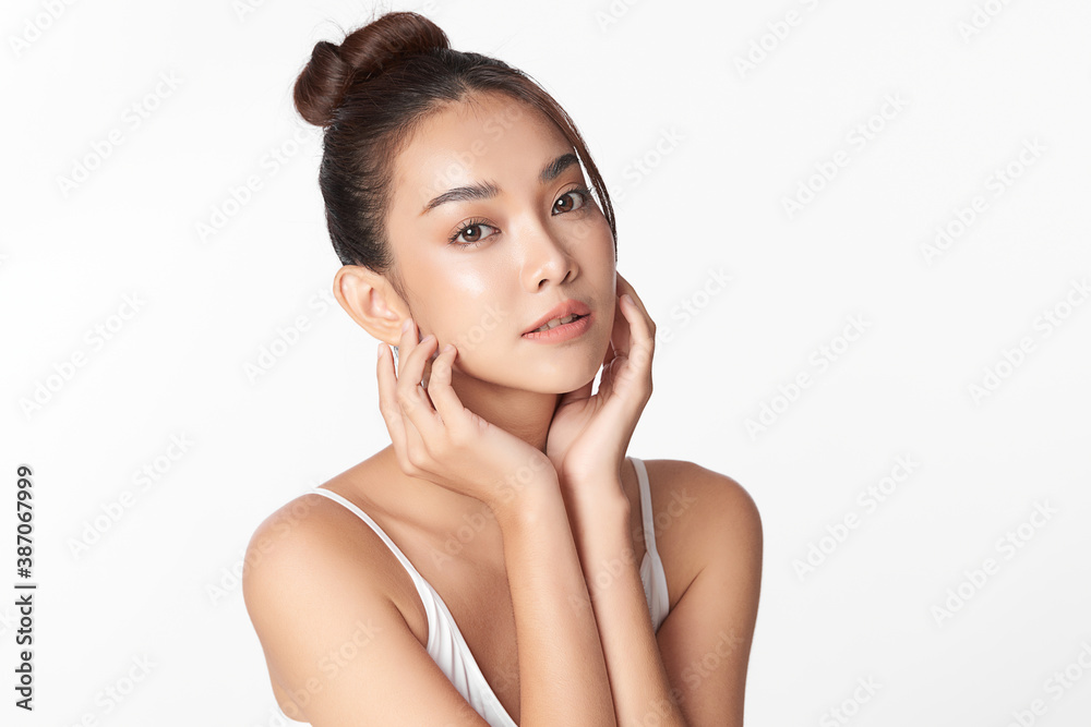 Beautiful young asian woman with clean fresh skin on white background, Face care, Facial treatment, Cosmetology, beauty and spa, Asian women portrait Beautiful young asian woman with clean fresh skin on white background, Face care, Facial treatment, Cosmetology, beauty and spa, Asian women portrait
