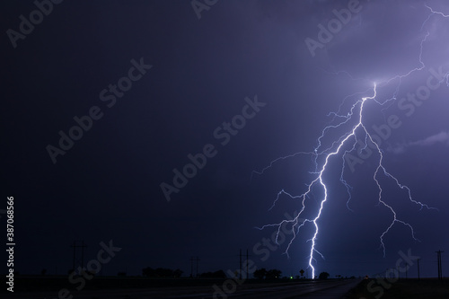 Lightning bolt strike in a storm at night