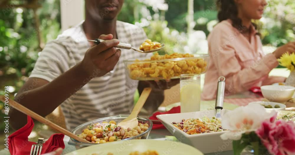 African American man spending time in garden