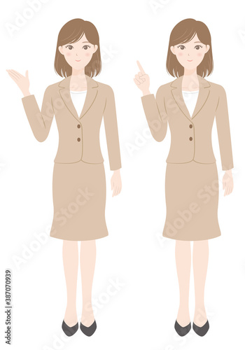 スーツ姿の女性　案内　指差し