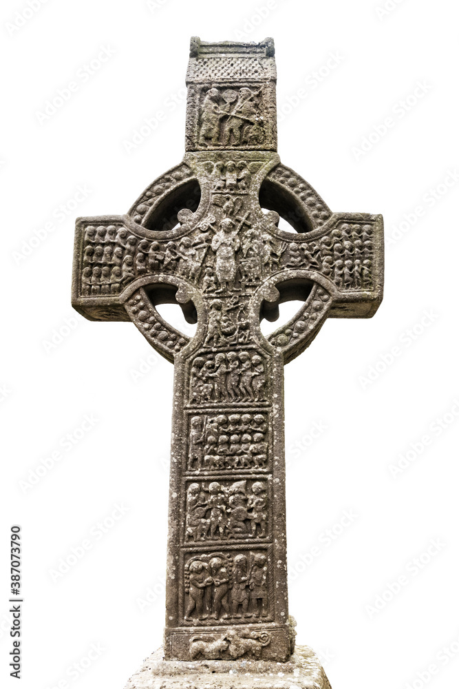 Drogheda, Ireland - July 15, 2020: View of East face of Muiredach's high celtic cross on white background at early Christian monastic settlement Monasterboice founded in 5th century. Drogheda, Ireland - July 15, 2020: View of East face of Muiredach's high celtic cross on white background at early Christian monastic settlement Monasterboice founded in 5th century.
