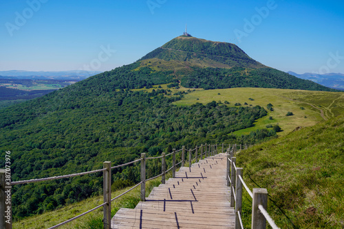 wooden walking path to access puy de dome french chain mountains volcano