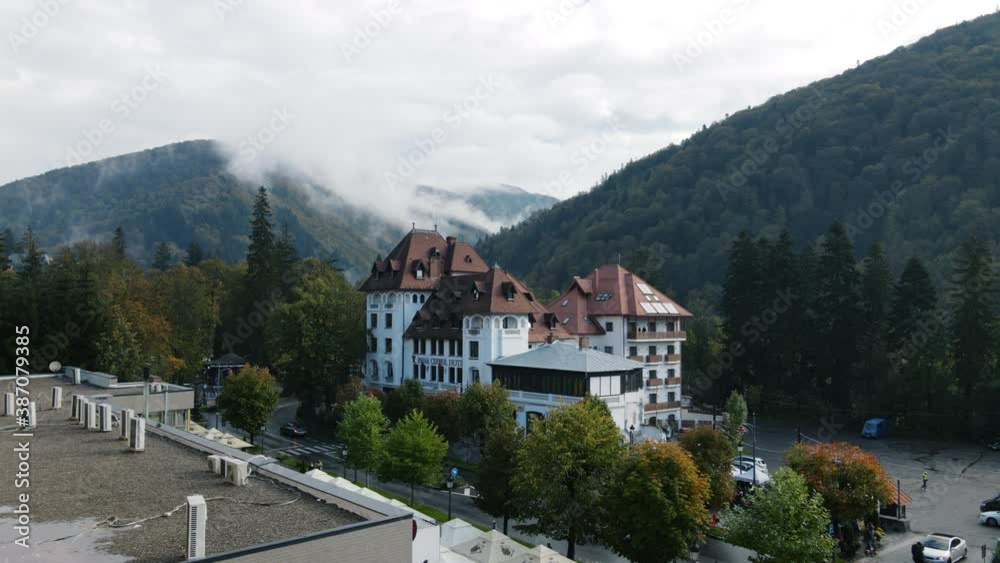 4K Hyperlapse Of An Hotel At The Base Of The Mountain Covered in Steam Clouds And Fog 4K Hyperlapse Of An Hotel At The Base Of The Mountain Covered in Steam Clouds And Fog
