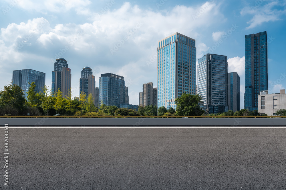 Road ground and modern architectural landscape skyline of Chinese city