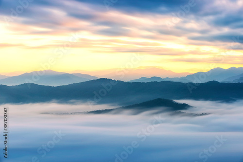 Scenic view of mountain and fog in morning sunrise  Landscape of natural