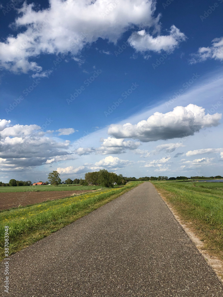 Bicycle path around the IJssel river in The Netherlands