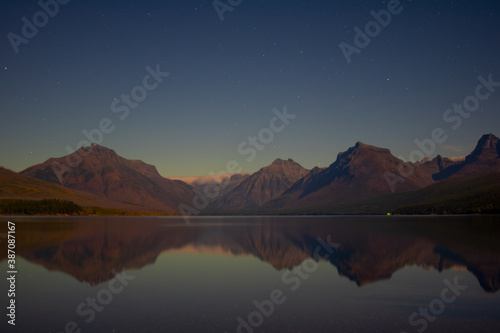 Moonlit night sky from the shore of Lake McDonald, Glacier National Park, MT, USA